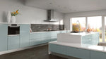 Modern kitchen with light blue cabinets and white countertops
