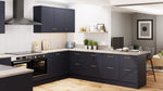 Modern kitchen with dark blue cabinets and light countertops